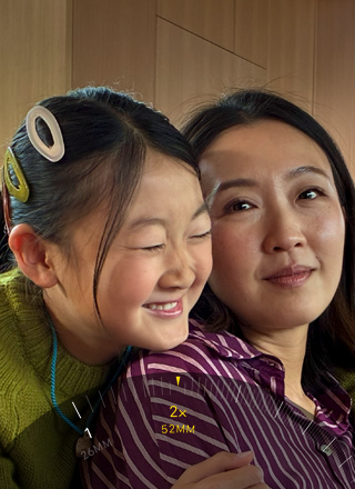 2x tele-funksjonen blir brukt til å zoome inn på et skogdekt fjell.